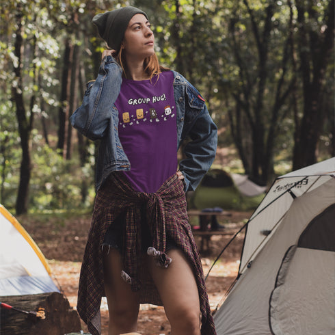 Introducing the ultimate camping fashion statement - our hilarious Group Hug T-shirt! Picture this: adorable cartoon s'mores characters sprinting after a rogue, blazing marshmallow like it's the last one on Earth. It's a scene straight out of a comedy sketch!